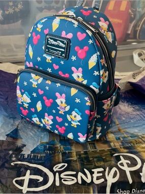 Disney Mini Backpack in Blue with Pink and Yellow Accents